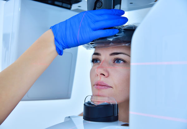 womans head in a 3D cat scanner